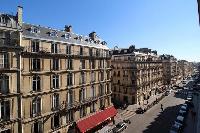 view from a lovely balcony in Paris luxury apartment overlooks the street