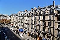 view from a lovely balcony in Paris luxury apartment overlooks the street