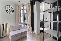 spacious living room in a 2-bedroom Paris luxury apartment