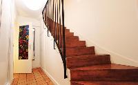 hallway and stairs in a 3-bedroom Paris luxury apartment