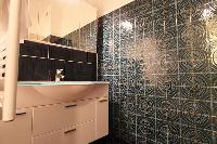 bathroom with sink  in a 3-bedroom Paris luxury apartment