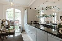 charming 3-bedroom Paris luxury apartment with a large living and dining area with an open kitchen