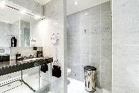 neat and trim toilet in Trocadéro - Poincaré 3 Bedrooms II luxury apartment