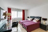 awesome bedroom of Trocadéro - Poincaré 3 Bedrooms II luxury apartment
