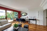 awesome living room with balcony at Trocadero - Poincaré 2 bedrooms luxury apartment