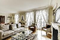 beautifully decorated open living area in a 2-bedroom Paris luxury apartment