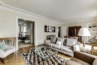 beautifully decorated open living area in a 2-bedroom Paris luxury apartment