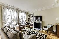 beautifully decorated open living area in a 2-bedroom Paris luxury apartment