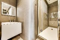 master bathroom with standing shower in Paris luxury apartment