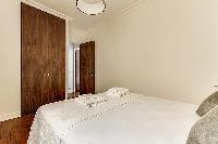 Bedroom with Queen size bed in a 2-bedroom Paris luxury apartment