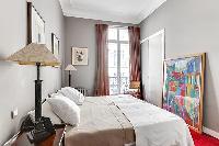 neat and fresh bedroom linens in Trocadero - Sheffer luxury apartment