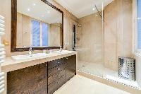 full bathroom with a toilet in a 3-bedroom Paris luxury apartment