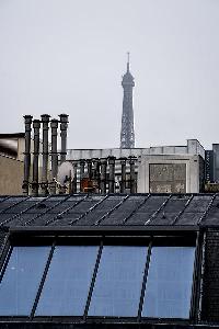 rooftop with view of the Eiffel Tower from a 2-bedroom paris luxury apartment