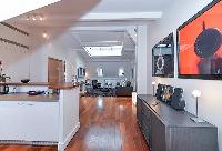 modern well-equipped kitchen and charming living area of a 2-bedroom paris luxury apartment