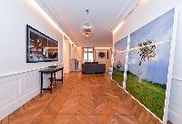 hallway with elegantly designed furnishings in a 3-bedroom paris luxury apartment