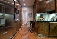 modern well-equiped kitchen in a 3-bedroom paris luxury apartment