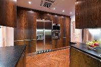 modern well-equiped kitchen in a 3-bedroom paris luxury apartment