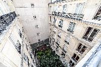 courtyard view from the French window in paris luxury apartment