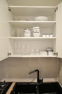 fully-equipped kitchen in a 2-bedroom Paris luxury apartment