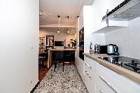 fully-equipped kitchen in a 2-bedroom Paris luxury apartment