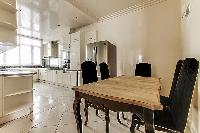 another table for food preparation in a 4-bedroom Paris luxury apartment