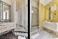 elegant en-suite bathroom with bathtub, lavatory, and full toilet in a 4-bedroom Paris luxury apartm