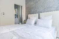 clean and crisp bedroom linens in Cannes - Church (Eglises) luxury apartment