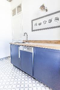 bool blue kitchen theme in Cannes - Pere Muret luxury apartment