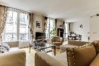 double-glazed windows with thick curtains in a Paris luxury apartment