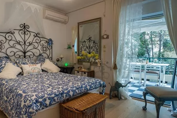 lovely bedroom with a balcony at Athens - Little Cloud Apartment luxury apartment