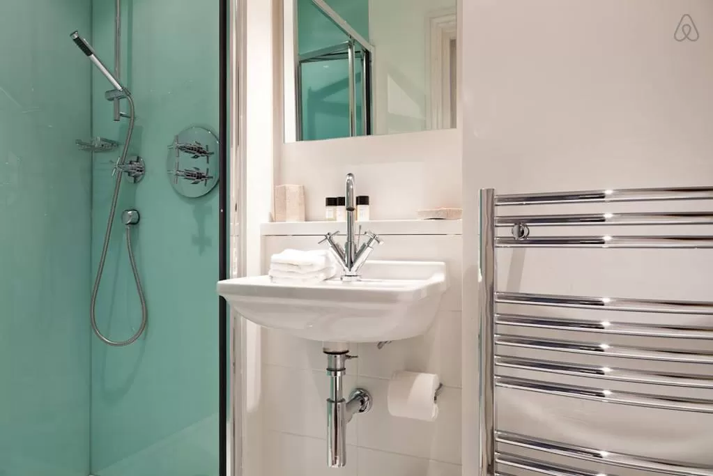 clean and fresh toilet and bath in London Doughty Double Studio luxury apartment