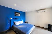 cool bedroom interiors of Corsica - Pinarellu luxury apartment