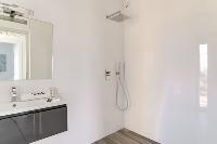 refreshing rain shower in a bathroom of Corsica - Figarella luxury apartment