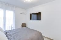 neat bedroom of Cannes Apartment Isola Bella luxury apartment